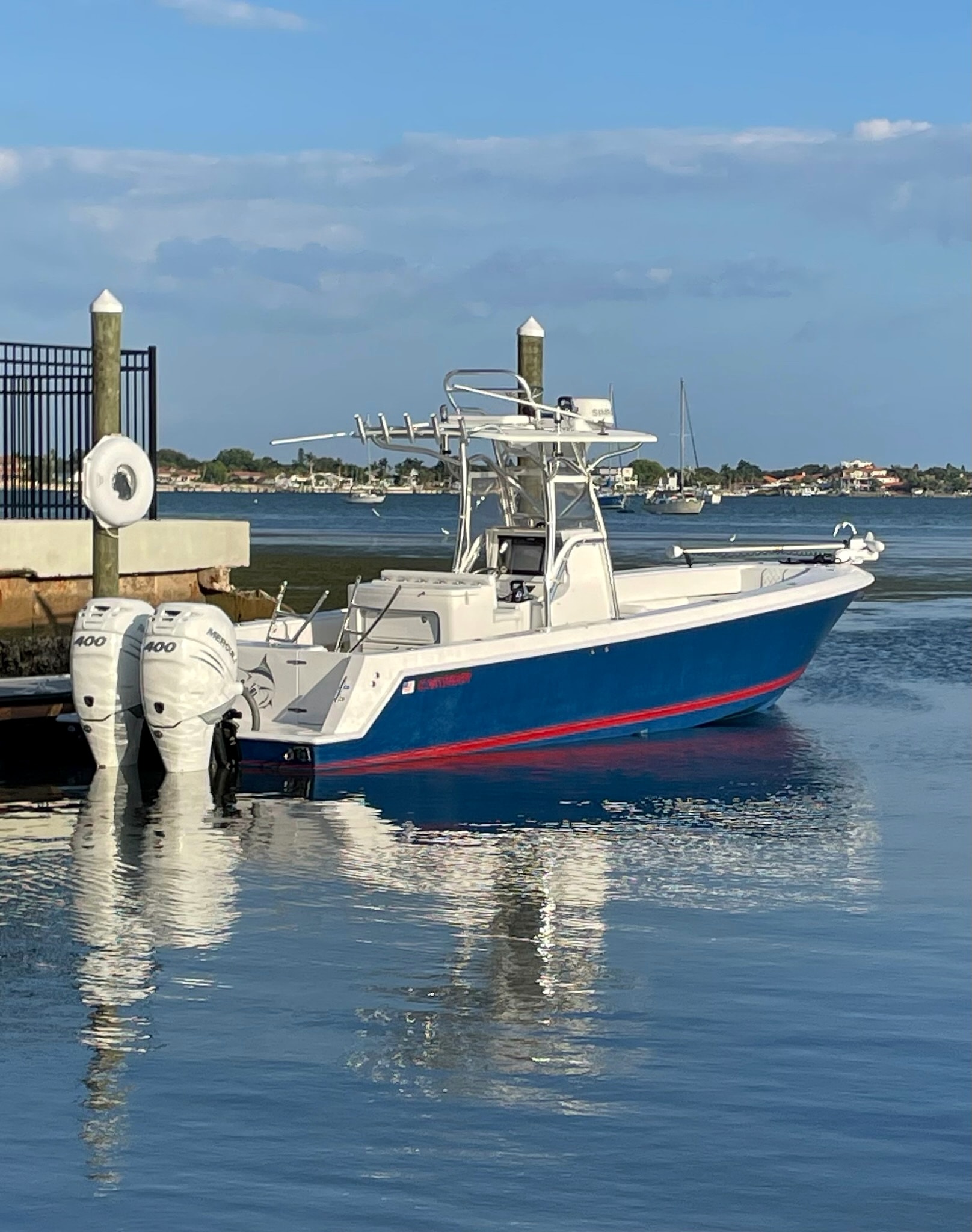 The 35' Contender on twin Mercury 400s tied up at Mariner's Cove